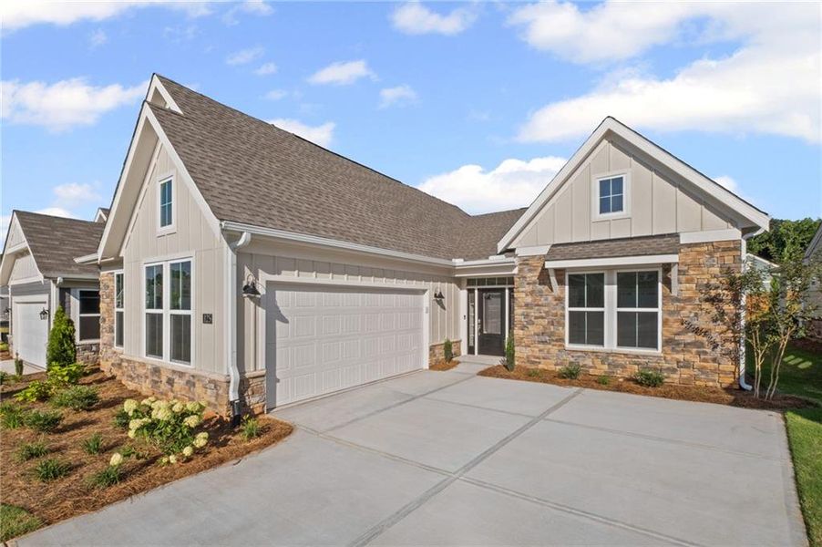 Front exterior of a new home in Laurel Farms, Dallas, GA, highlighting curb appeal (Image 31). Front exterior of a new home in Laurel Farms, Dallas, GA, highlighting curb appeal (Image 31).