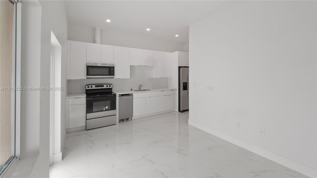 Furnished interior view inside a new home in , Miami (Image 13). Furnished interior view inside a new home in , Miami (Image 13).