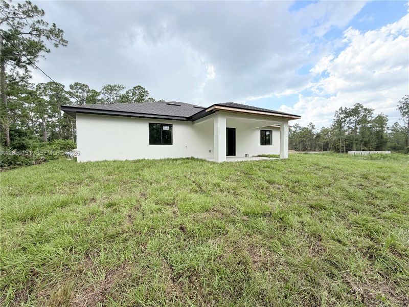 Exterior details and patio area of a home in , Lehigh Acres (Image 25).