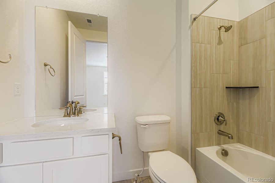 Furnished interior view inside a new home in Macanta: The Grand Collection, Castle Rock (Image 6).