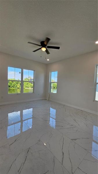 Spacious, unfurnished interior of a new home in , Port Charlotte (Image 21).