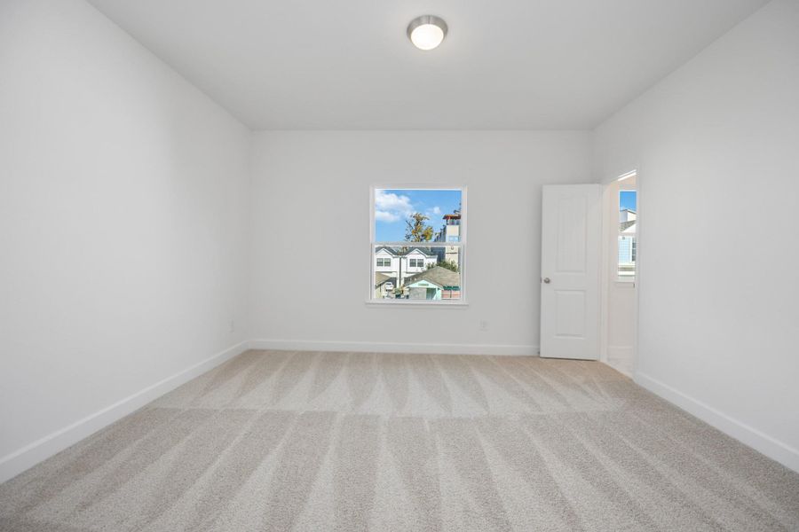 Bright, airy, and ready to become a cozy retreat, this bedroom offers the perfect blank canvas for your personal style.