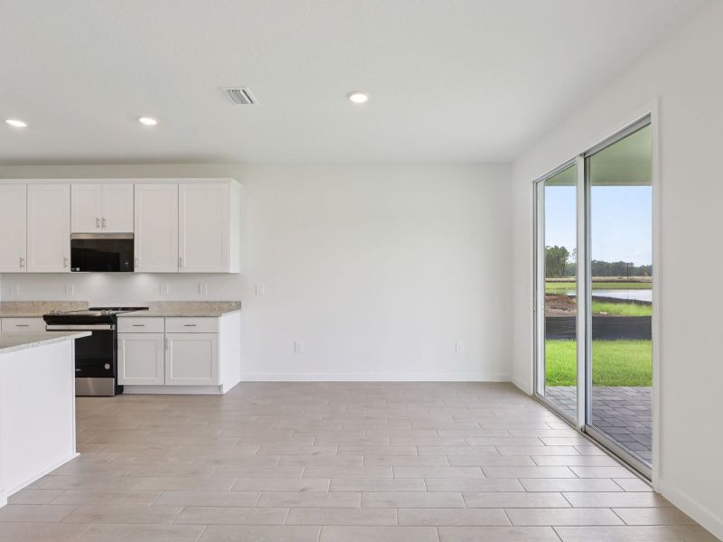 Spacious, unfurnished interior of a new home in Flagler Village - Signature Series, Palm Coast (Image 7).