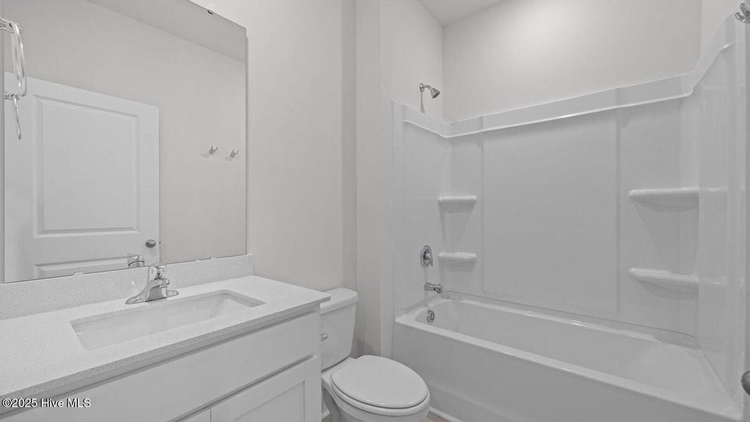 Furnished interior view inside a new home in Tyler - Home on the Lake, New Bern (Image 7).