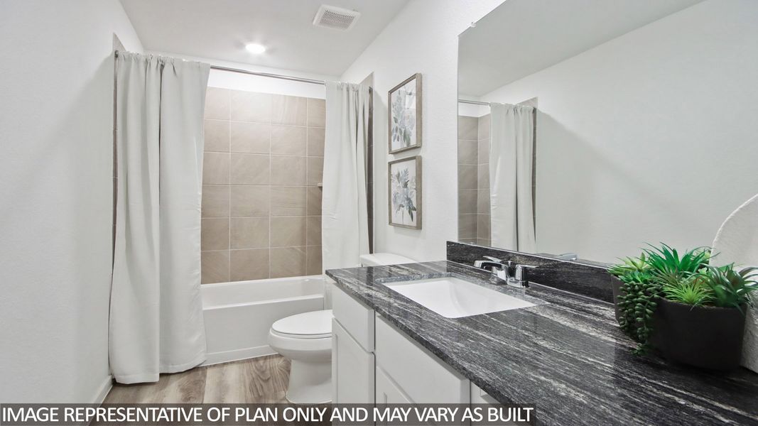 Furnished interior view inside a new home in Bridges on Lake Houston Villas, Humble (Image 11).