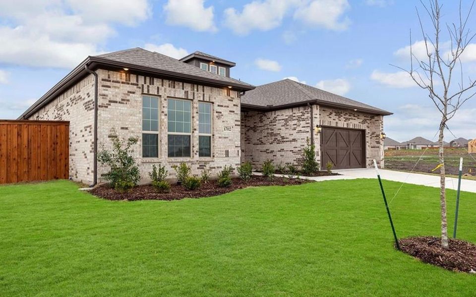Representative exterior photo of a completed home built from the Santa Barbara by CastleRock Communities in Solterra, Mesquite, TX (Image 18).