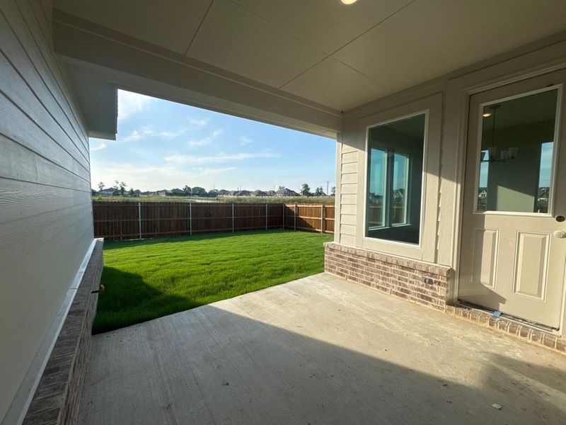 Exterior details and patio area of a home in Cedar Ridge Estates, Anna (Image 3).