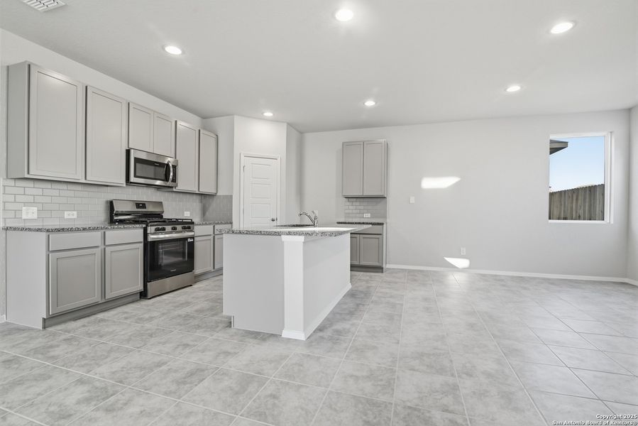 Furnished interior view inside a new home in Hunters Ranch, San Antonio (Image 9).