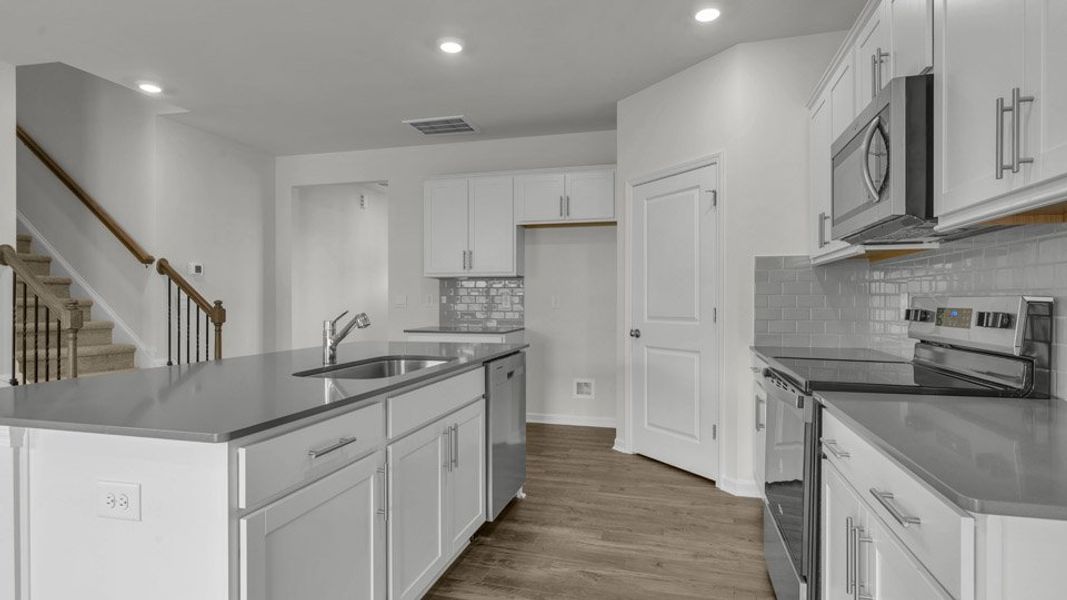 Furnished interior view inside a new home in The Preserve at Kinsley, Jamestown (Image 6). Furnished interior view inside a new home in The Preserve at Kinsley, Jamestown (Image 6).