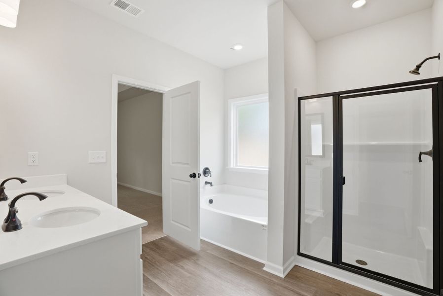 Representative furnished interior of a home built from the Magnolia Select M by McGuinn Homes in Broadway Lake, Anderson (Image 12).