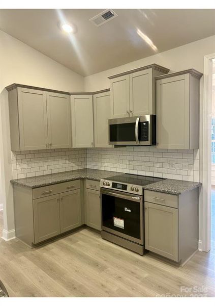 Furnished interior view inside a new home in Crystal Village, Albemarle (Image 5). Furnished interior view inside a new home in Crystal Village, Albemarle (Image 5).