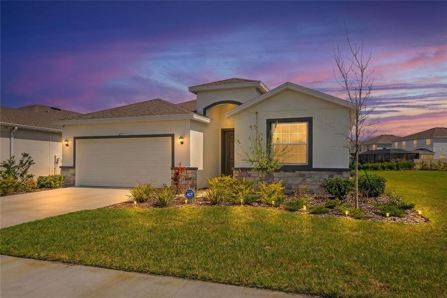 Front exterior of a new home in Coddington, Bradenton, FL, highlighting curb appeal (Image 24).