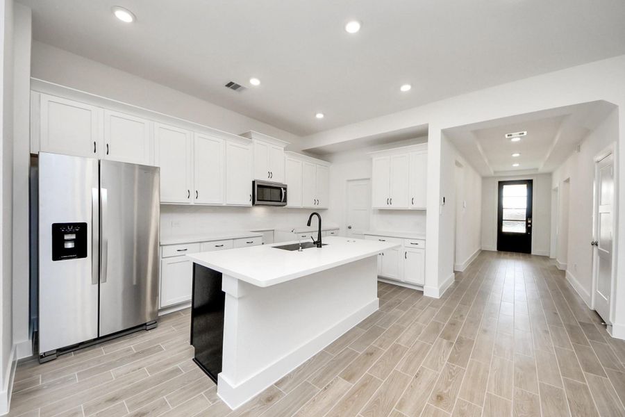 Furnished interior view inside a new home in Sunterra: Landmark Collection, Katy (Image 15).