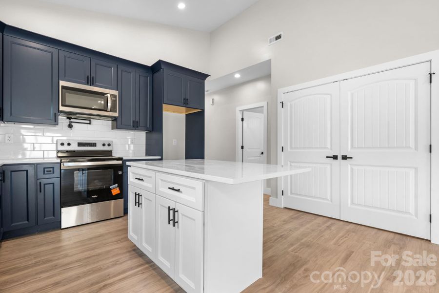 Furnished interior view inside a new home in , Lenoir (Image 4).