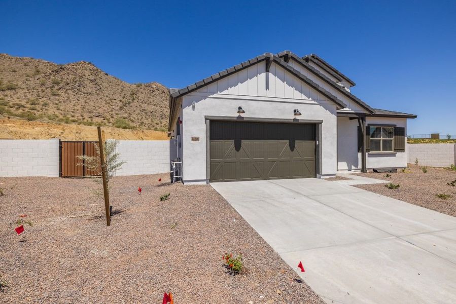 Representative exterior photo of a completed home built from the Ponderosa by William Ryan Homes in Silver Cross, San Tan Valley, AZ (Image 32).