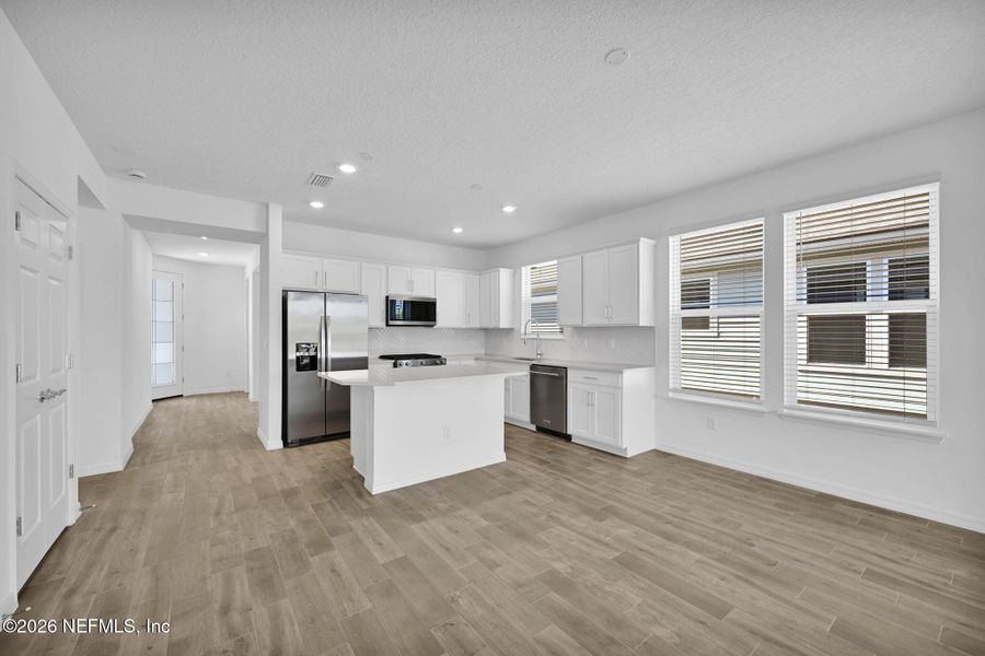 Furnished interior view inside a new home in Del Webb Wildlight, Yulee (Image 5).