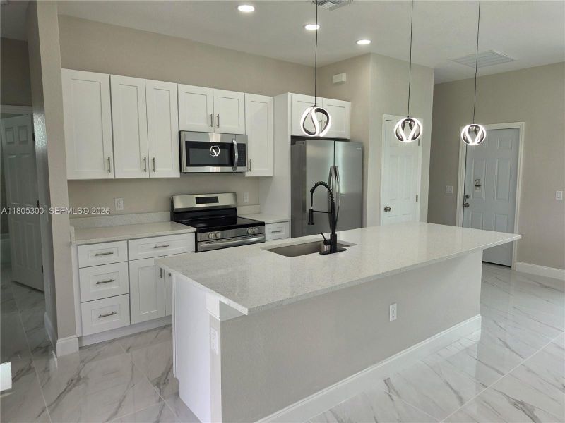 Furnished interior view inside a new home in , Lehigh Acres (Image 6).