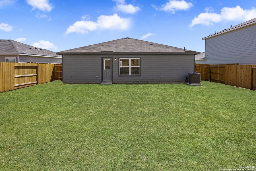 Exterior details and patio area of a home in Rosewood Estates, Lytle (Image 2).