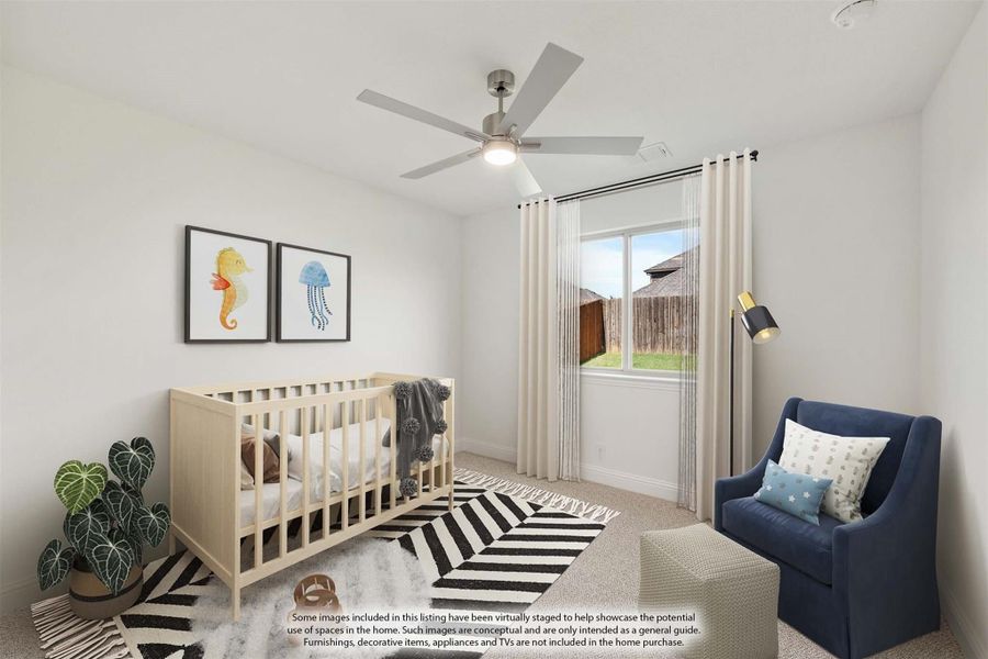 Nursery with wood crib, ceiling fan, blue armchair, and patterned area rug on carpet flooring