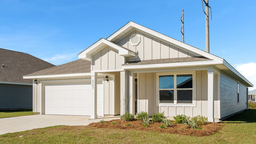 Front exterior of a new home in Titus Park, Panama City, FL, highlighting curb appeal (Image 18). Front exterior of a new home in Titus Park, Panama City, FL, highlighting curb appeal (Image 18).