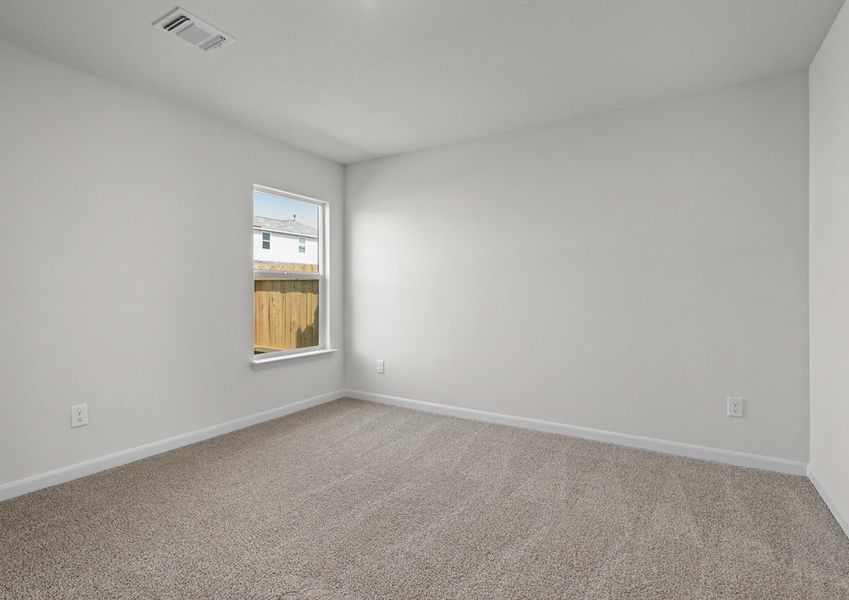 The master bedroom has a large window that lets in great, natural light.