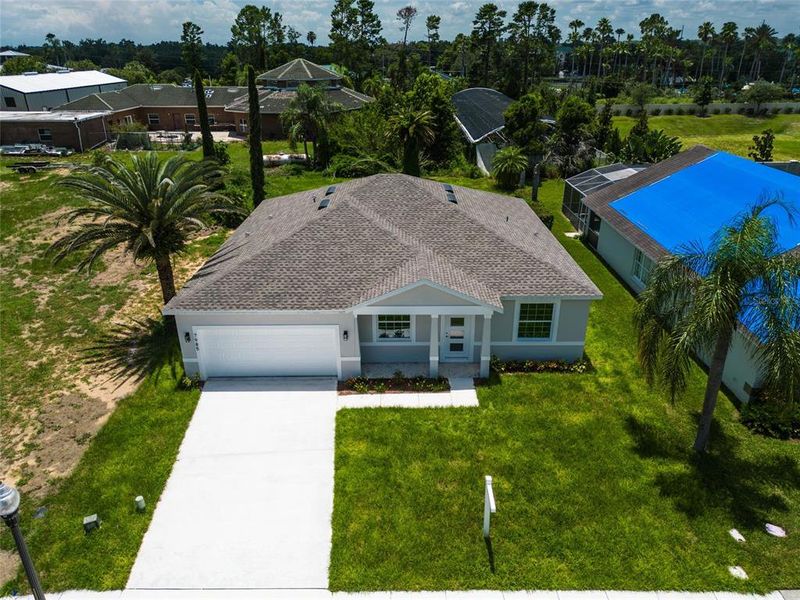 Front exterior of a new home in , Kissimmee, FL, highlighting curb appeal (Image 29).