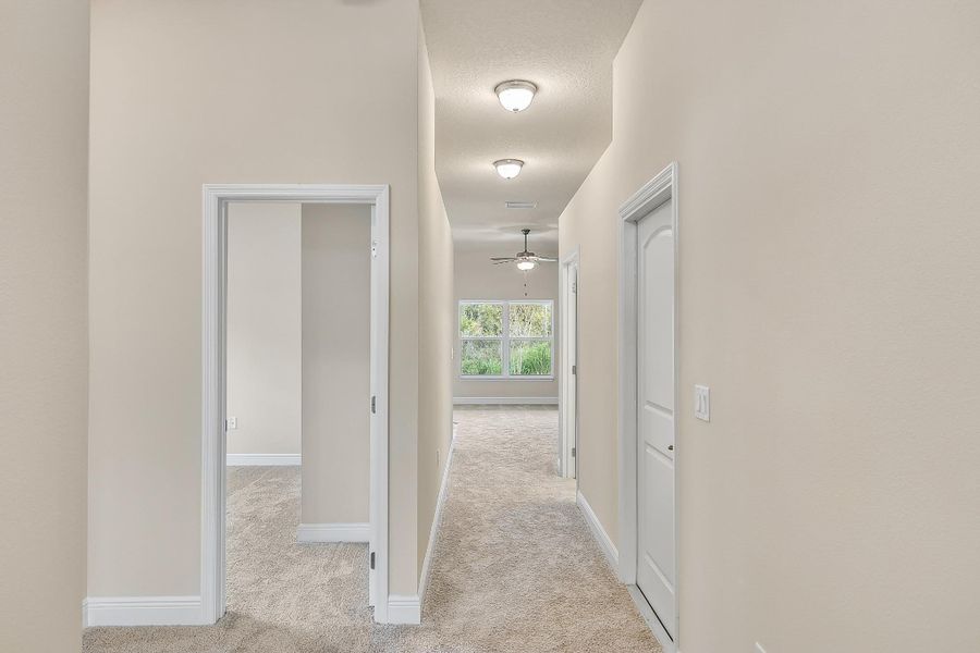 Representative unfurnished interior of a home built from the 1512 by Adams Homes in Winding Oaks, Weeki Wachee (Image 11). Representative unfurnished interior of a home built from the 1512 by Adams Homes in Winding Oaks, Weeki Wachee (Image 11).
