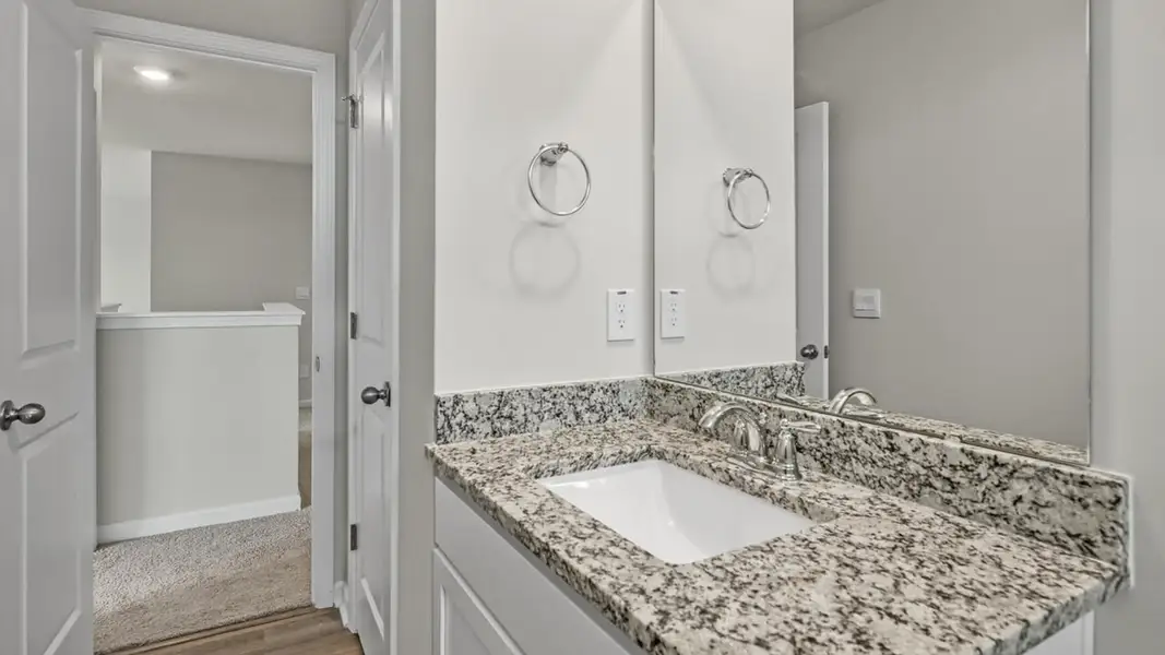 Furnished interior view inside a new home in Surfside Landing, Hubert (Image 12).