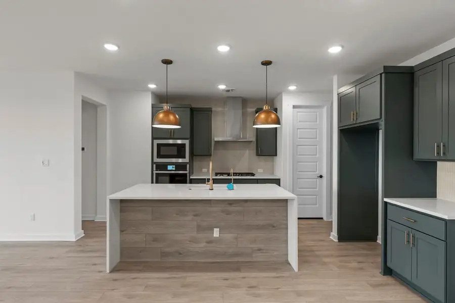 Furnished interior view inside a new home in Terrace Collection at Lariat, Liberty Hill (Image 11).