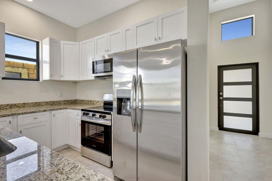 Furnished interior view inside a new home in , Indiantown (Image 5).