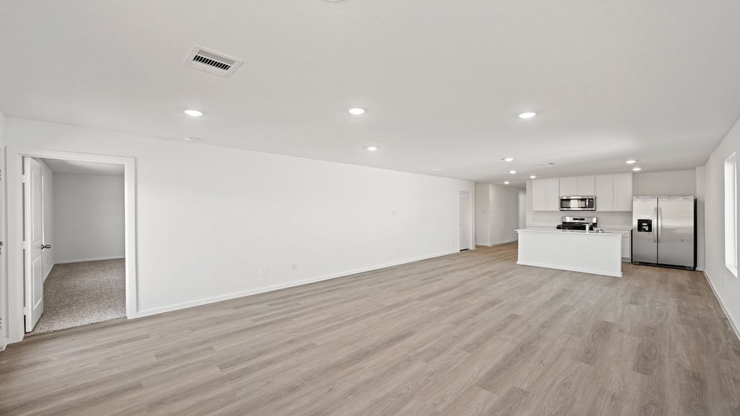 Representative unfurnished interior of a home built from the Carson by D.R. Horton in Lexington Heights, Willis (Image 12).