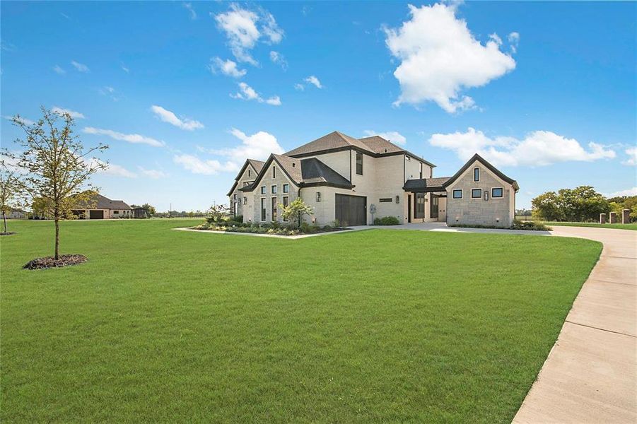 Front exterior of a new home in , McKinney, TX, highlighting curb appeal (Image 24). Front exterior of a new home in , McKinney, TX, highlighting curb appeal (Image 24).