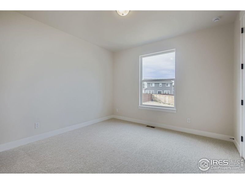 Spacious, unfurnished interior of a new home in RainDance National 60/70, Windsor (Image 23).