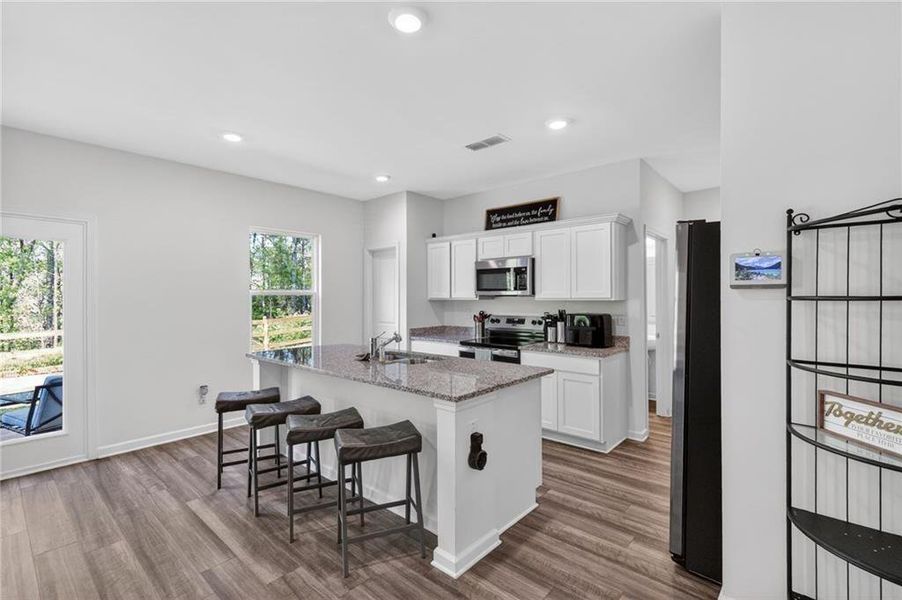 Furnished interior view inside a new home in Meriwether Place, Villa Rica (Image 11).