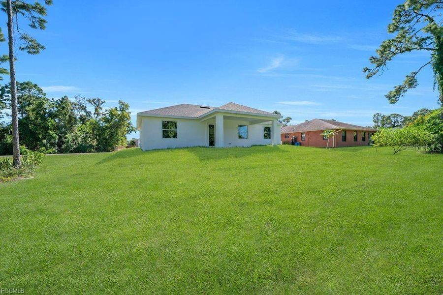 Exterior details and patio area of a home in , Lehigh Acres (Image 19).