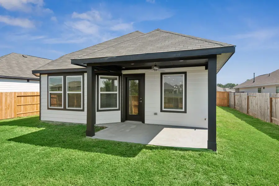 Exterior details and patio area of a home in Magnolia Ridge, Magnolia (Image 4). Exterior details and patio area of a home in Magnolia Ridge, Magnolia (Image 4).