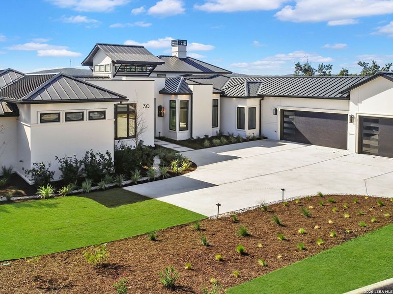 Front exterior of a new home in , San Antonio, TX, highlighting curb appeal (Image 27).