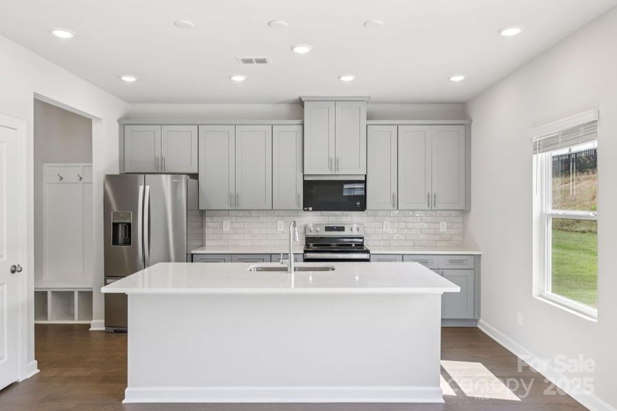 Photo is not of the actual home, but is an inspirational photo of builder’s model home and may depict options, furnishings, and/or decorator features that are not included