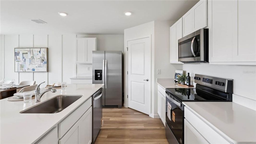 Furnished interior view inside a new home in Fletcher Trace, Alachua (Image 5). Furnished interior view inside a new home in Fletcher Trace, Alachua (Image 5).