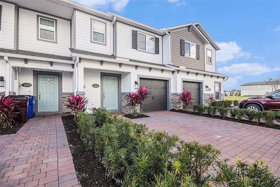 Front exterior of a new home in , St. Cloud, FL, highlighting curb appeal (Image 2). Front exterior of a new home in , St. Cloud, FL, highlighting curb appeal (Image 2).
