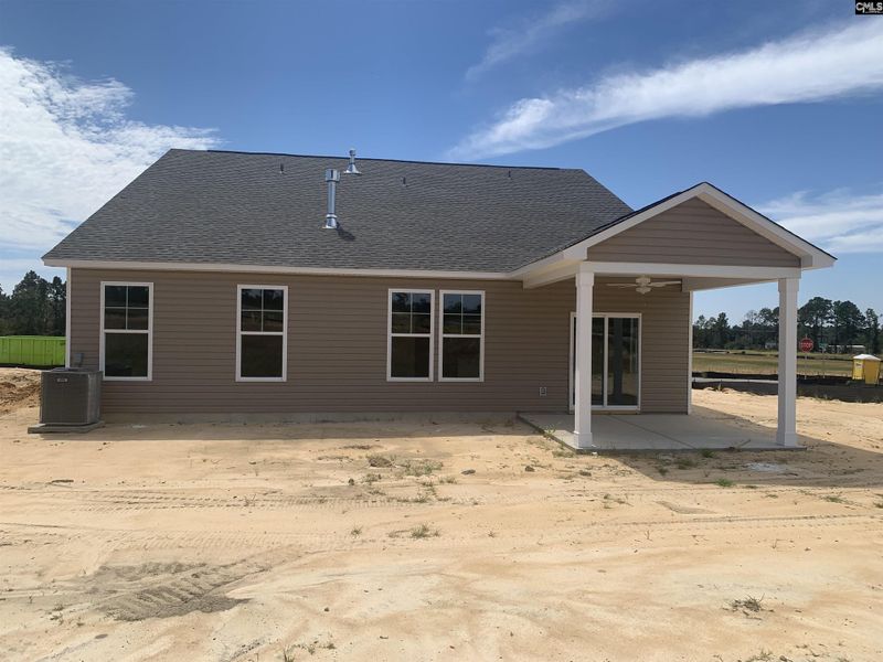 Front exterior of a new home in Peachtree Hills, Lexington, SC, highlighting curb appeal (Image 2).