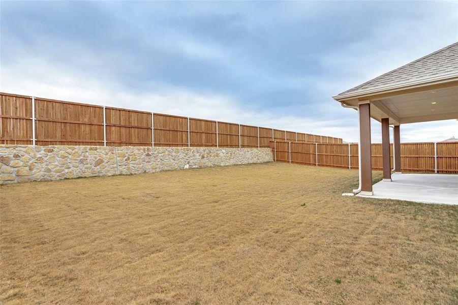 Exterior details and patio area of a home in Sierra Vista at Kelly Ranch, Aledo (Image 3).