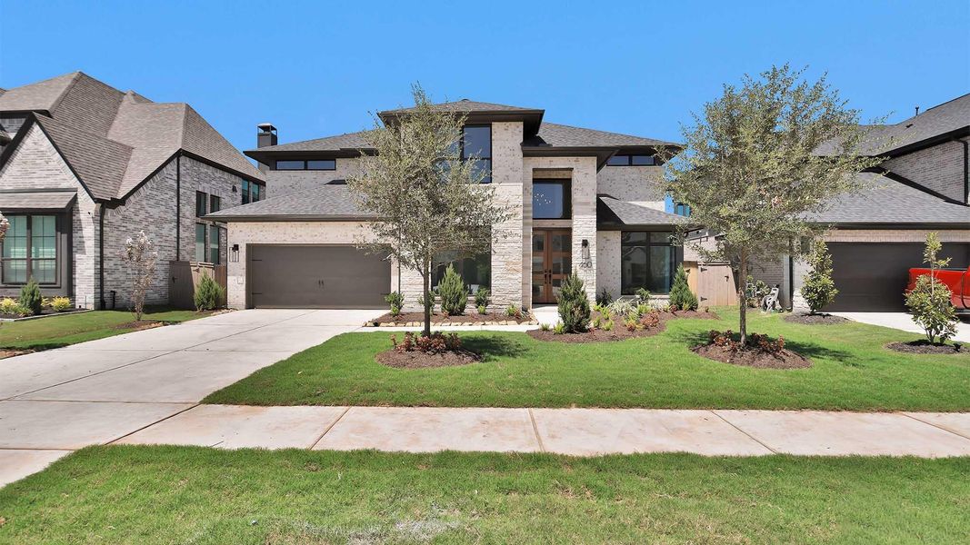 Front exterior of a new home in Grange, Katy, TX, highlighting curb appeal (Image 2).