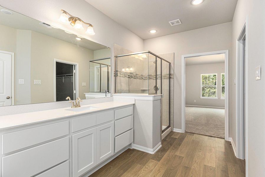 Furnished interior view inside a new home in , Conroe (Image 6).