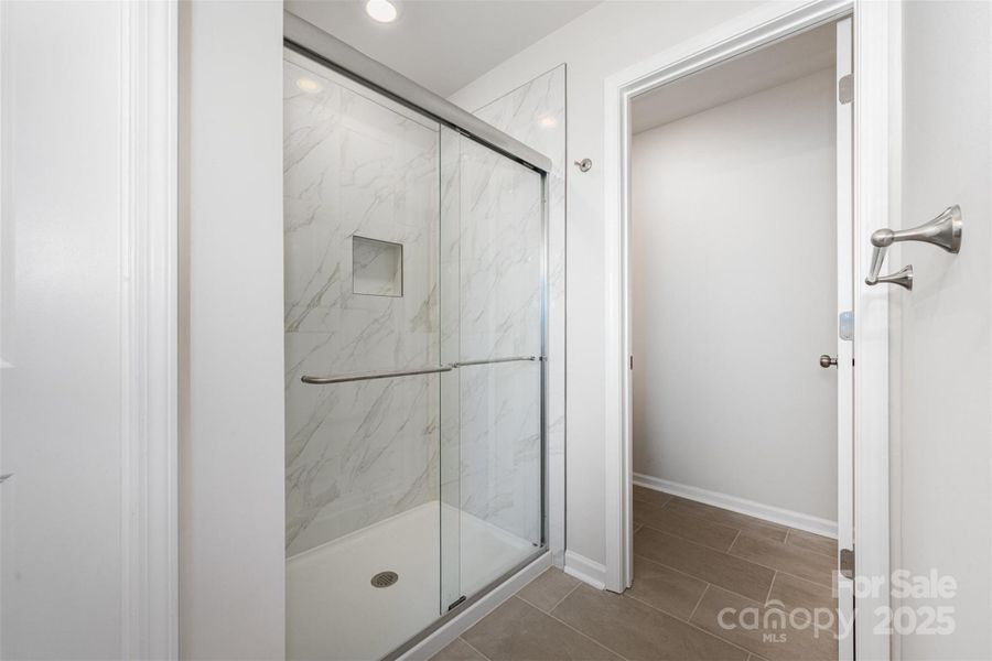 Tile floor & shower. Representational Photo Tile floor & shower. Representational Photo