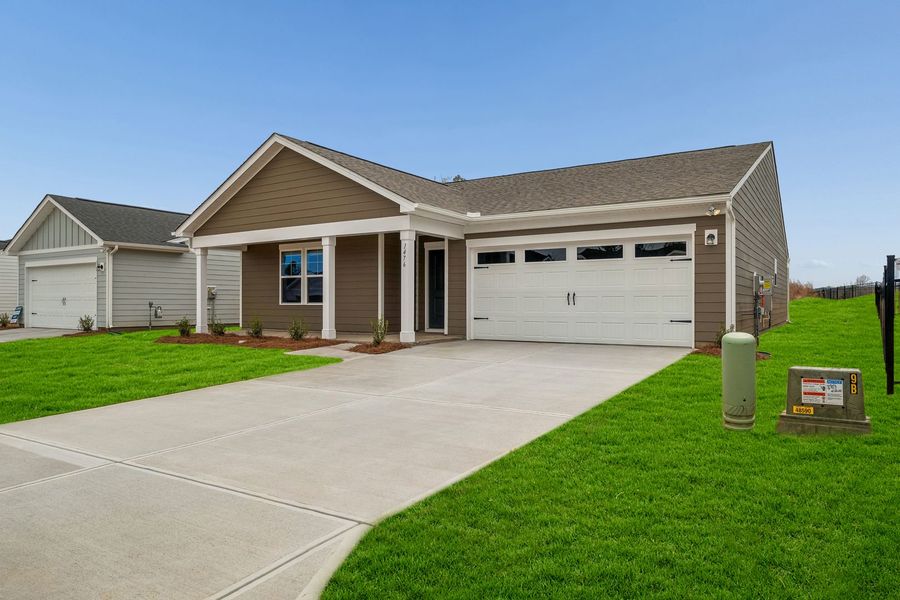 Front exterior of a new home in The Retreat at Laurelbrook, Sherrills Ford, NC, highlighting curb appeal (Image 2). Front exterior of a new home in The Retreat at Laurelbrook, Sherrills Ford, NC, highlighting curb appeal (Image 2).