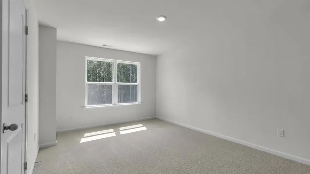Spacious, unfurnished interior of a new home in The Townes at Prestleigh, Wake Forest (Image 22).