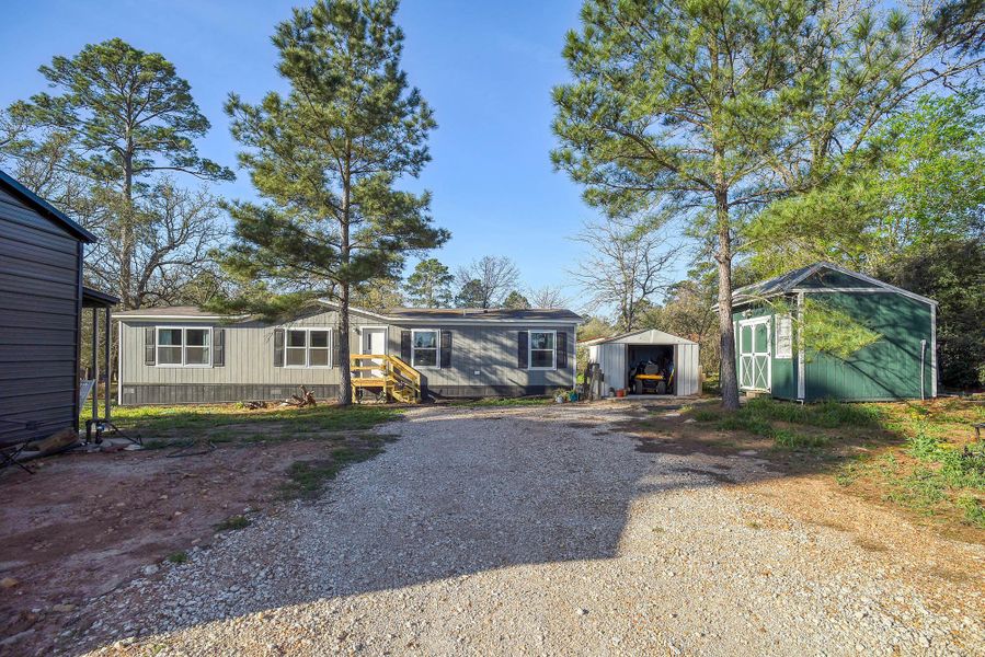 Exterior details and patio area of a home in , Bastrop (Image 18).