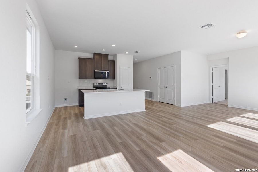 Spacious, unfurnished interior of a new home in Hidden Bluffs at TRP, San Antonio (Image 13).