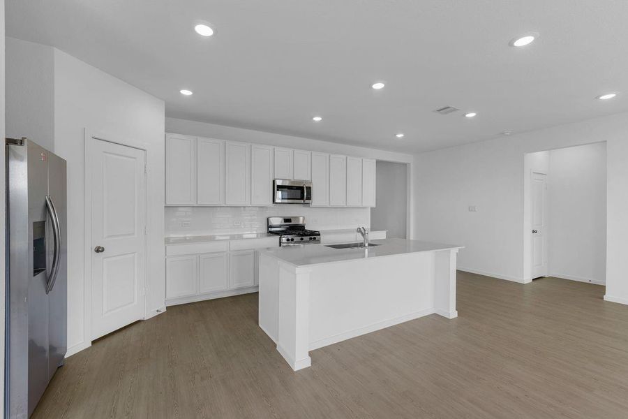 Furnished interior view inside a new home in Riverwood Ranch, Angleton (Image 4).